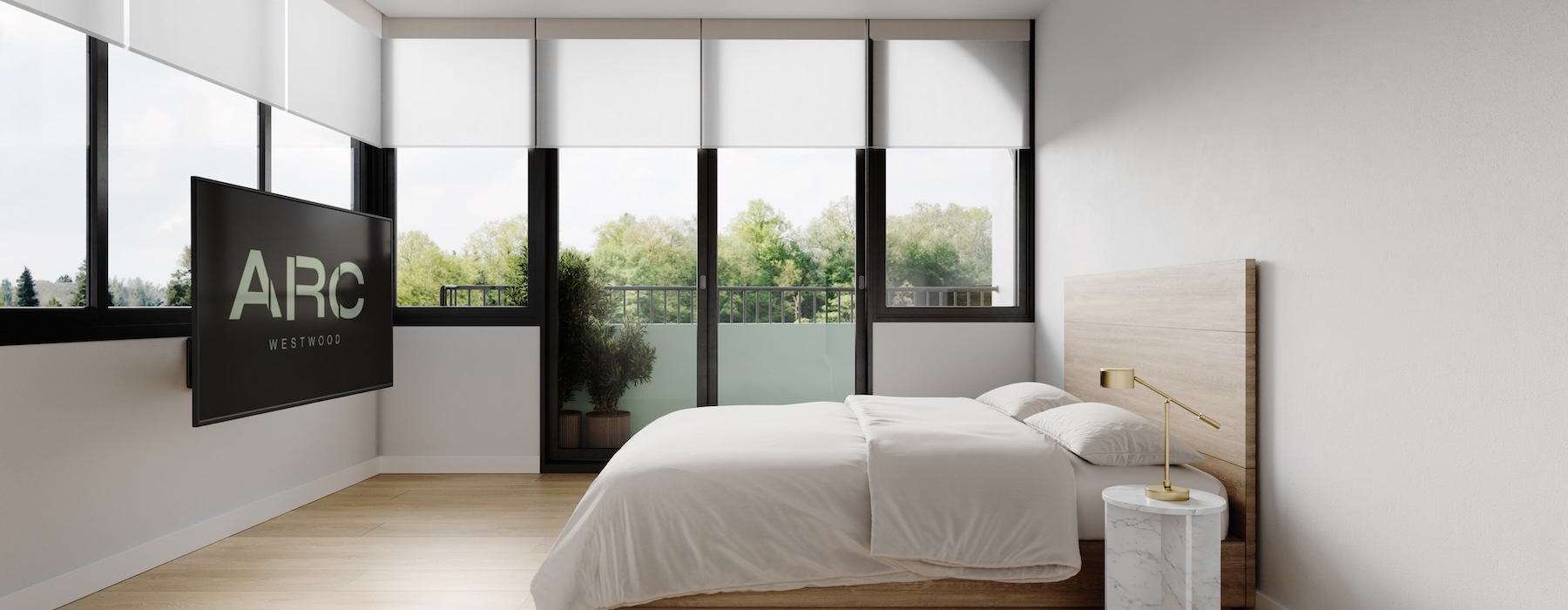 a bedroom with a large window and a tv